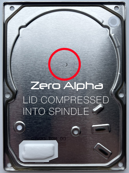 hard drive lid compressed into spindle motor seizure data recovery